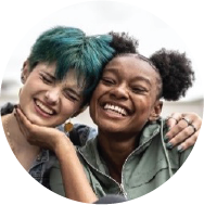 A peer support specialist and her client standing next to each other
